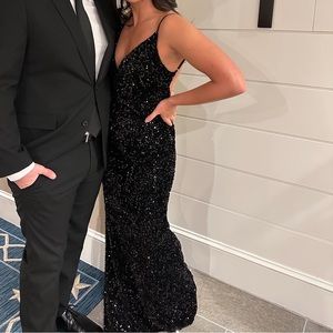 Black sequin body con dress